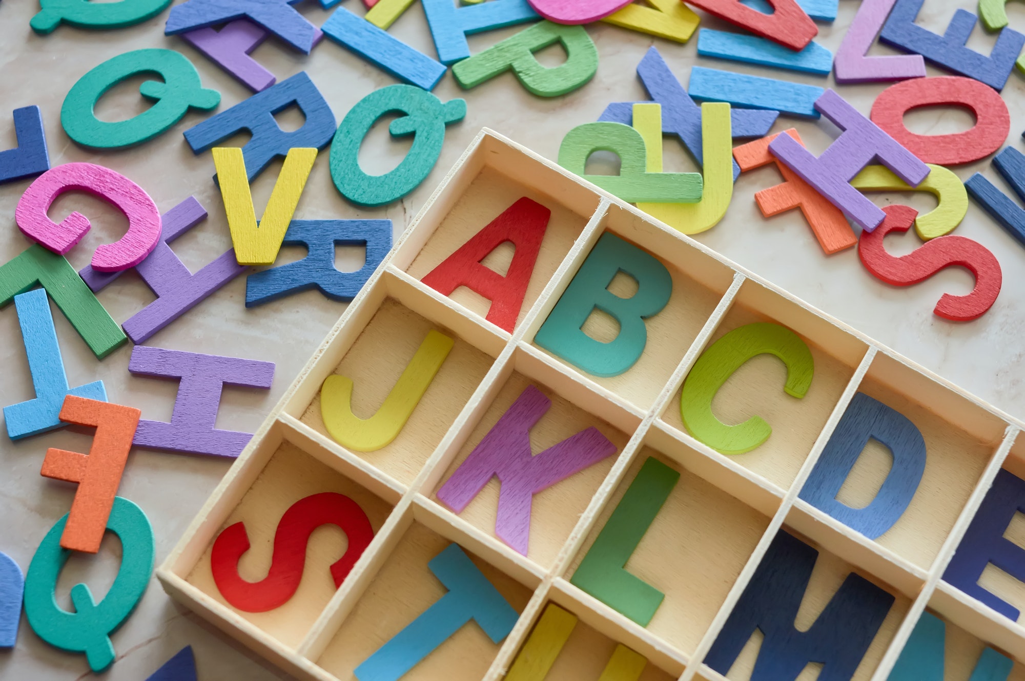 the colorful wooden alphabet toy.jpg